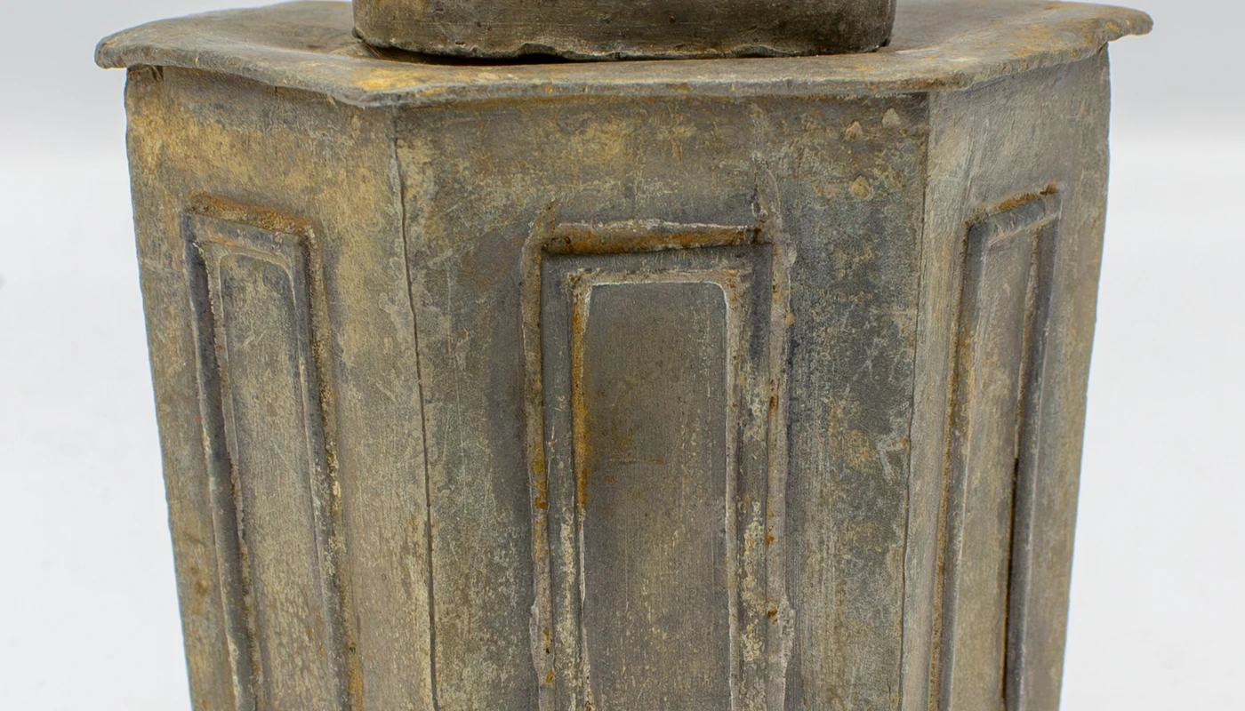 A photo of a tea cannister found at Shiloh Baptist Church.
