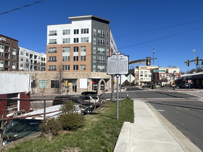 Picture of Tinner Hill Historic Plaque and monument in front of apartment_wide