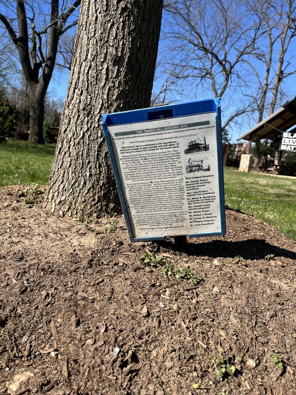 Tinner Hill Historic Site board next to tree