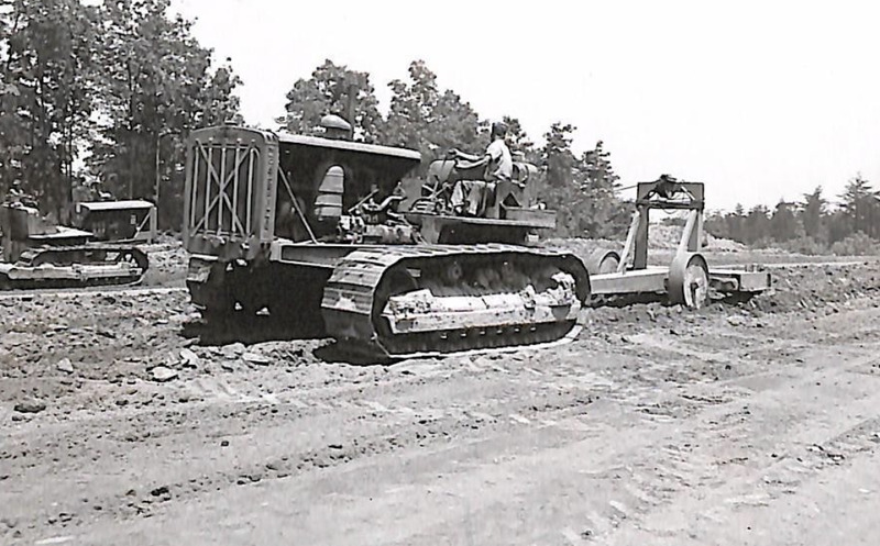 Bulldozer working on a dirt road in Fairfax County, post World War II.