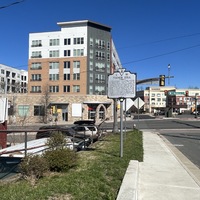 Picture of Tinner Hill Historic Plaque and monument in front of apartment_wide