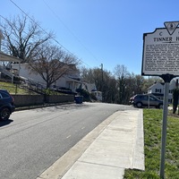 Picture of Tinner Hill Historic Plaque and Tinner Hill in background