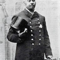 Portrait of John A. Seaton standing in front of a portrait background circa 19th century.