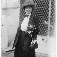 Photograph of Mrs. W.B. Meloney standing on the deck of a ship, circa 1920.